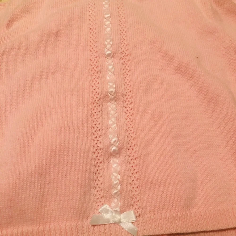 Pink button down sweater from Hartstrings